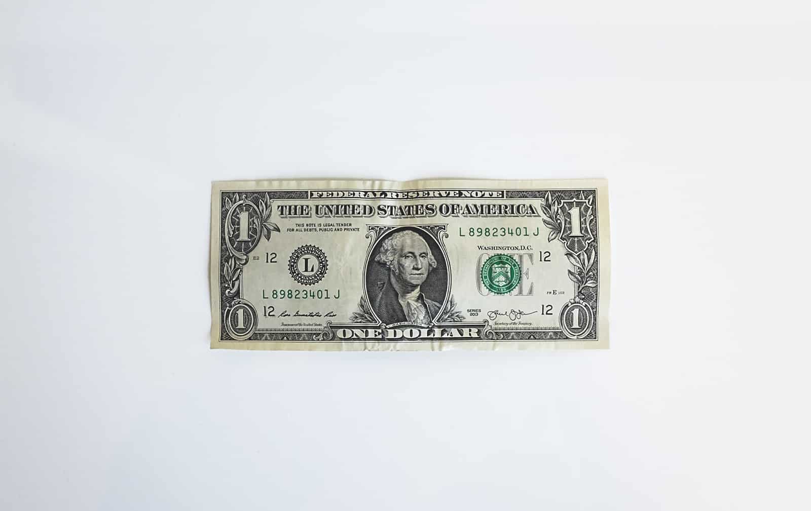 An image of a single dollar on a white background