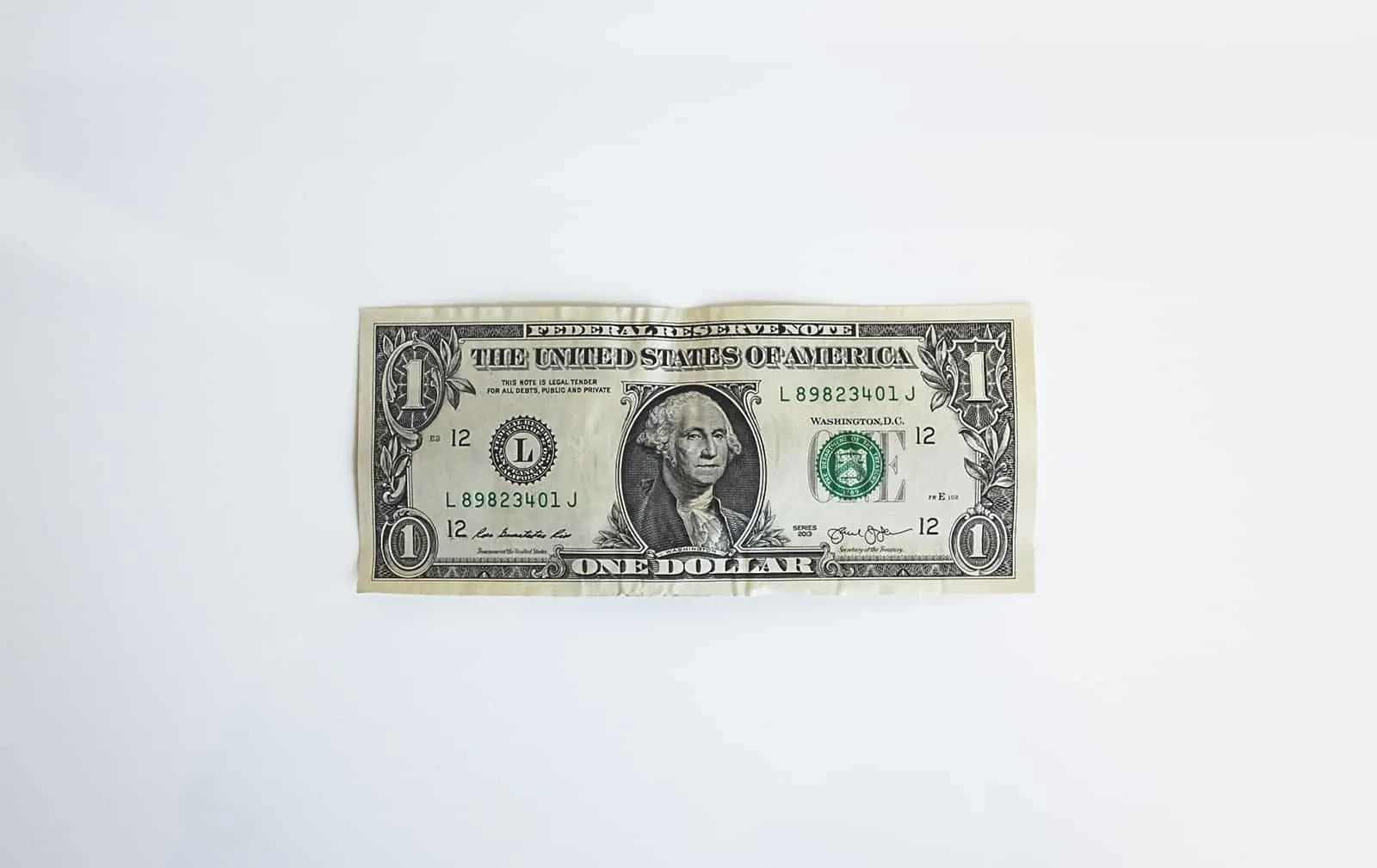 An image of a single dollar on a white background
