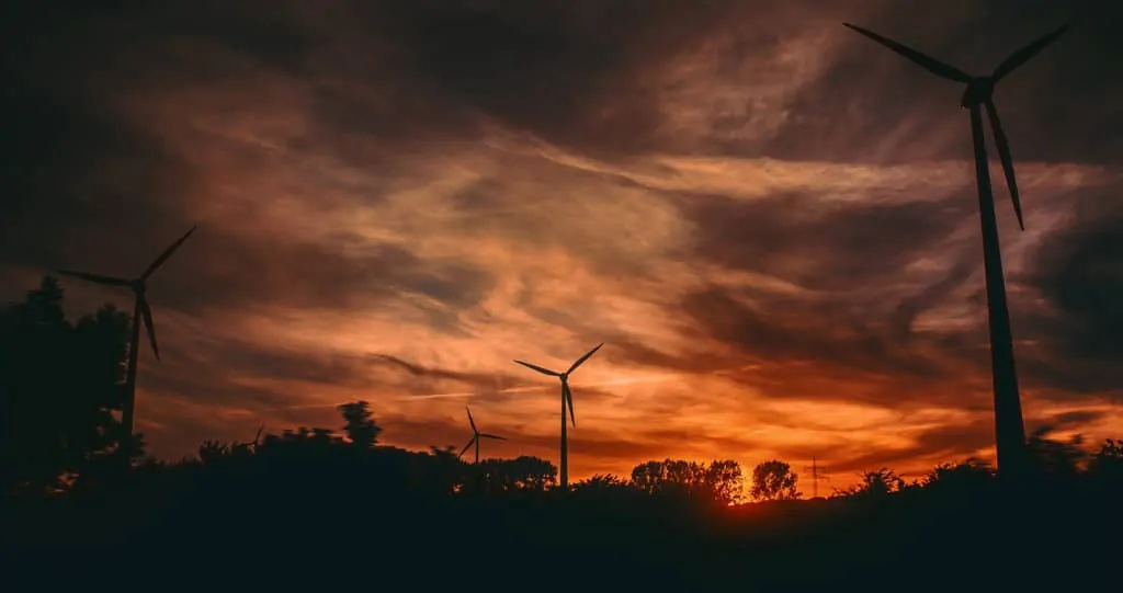Image of wind turbines at sunset